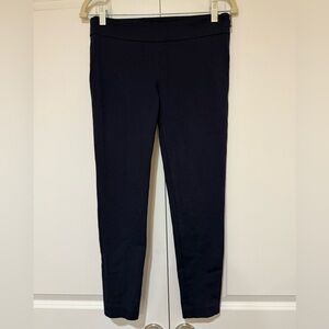 Ann Taylor Navy Ankle Pants with back pockets and side zipper material tag faded